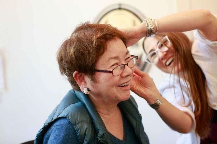 Lady having her hearing aids fitted