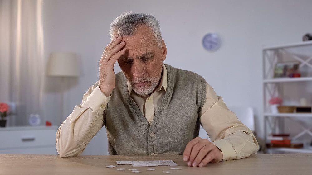 A senior man suffering from cognitive function decline