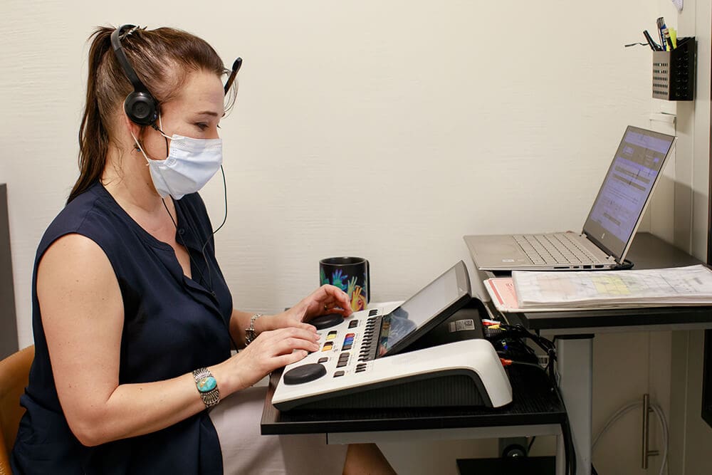 Dr. Jessica Muscio Traylor Performing Comprehensive Hearing Assessment